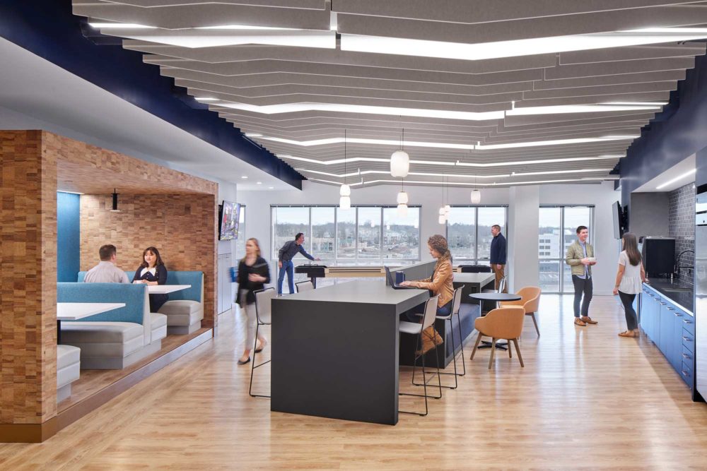 Acoustic panels and pendant lighting installed in a service center