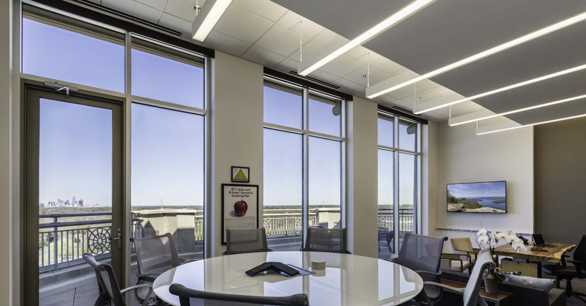 Linear suspended lighting in a seating space