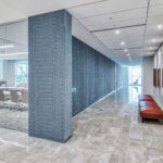 Recessed downlights in an office hallway