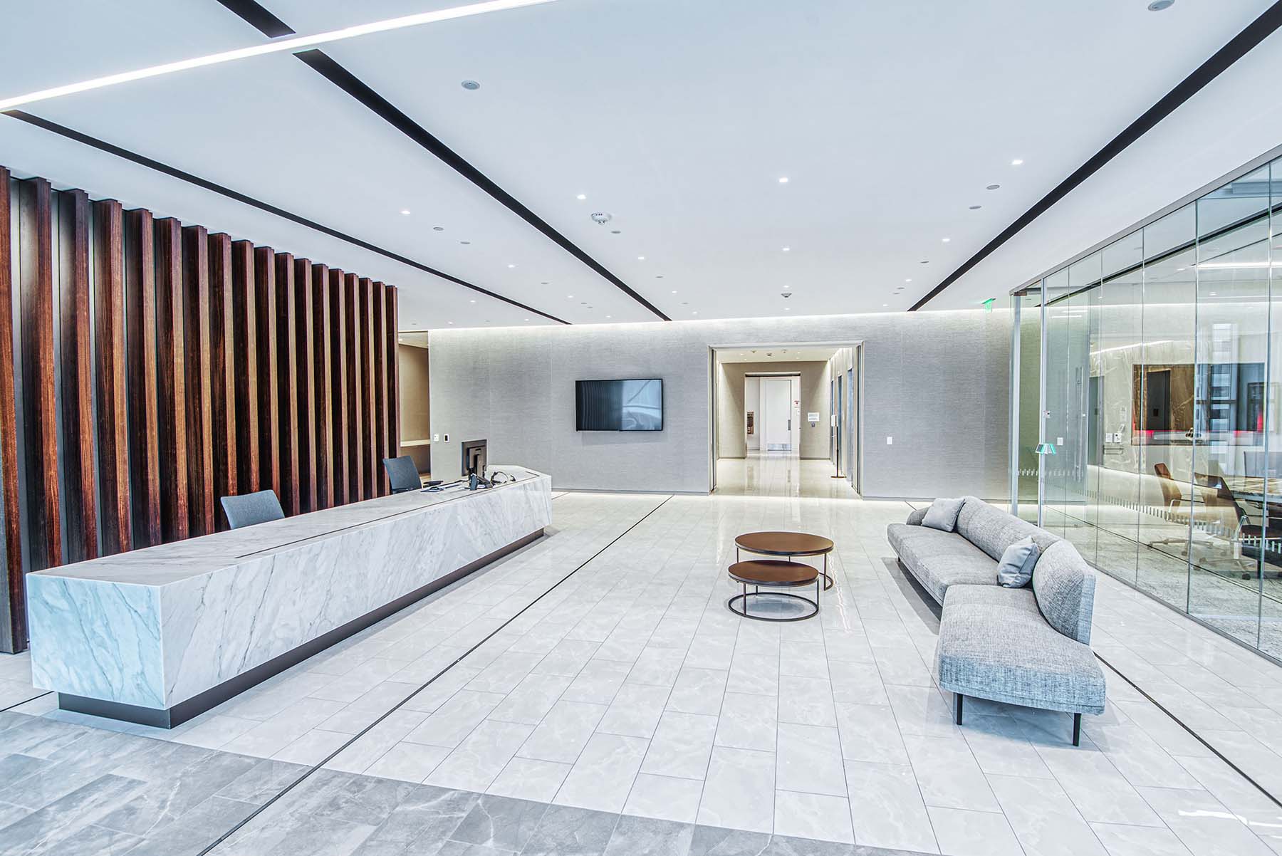 Recessed linear lighting in an office lobby